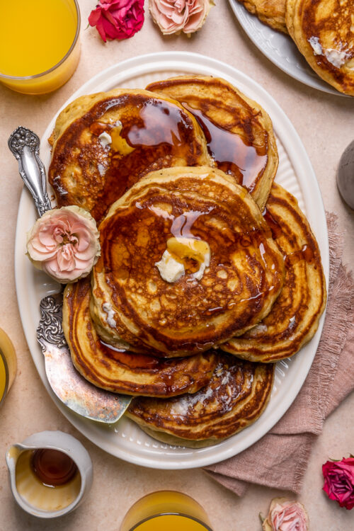 My Favorite Buttermilk pancakes are thick, fluffy, and made totally from scratch! A super easy pancake recipe that's also freezer friendly. The perfect breakfast to please the whole family!