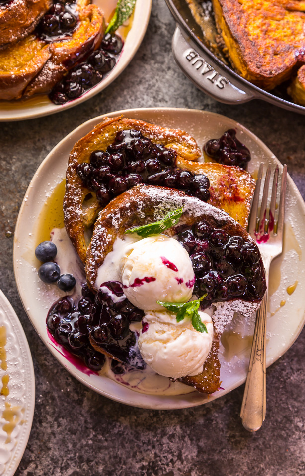 Buttery slices of brioche bread and fresh blueberry maple syrup make this recipe a total showstopper! While it's a little more work than most breakfast casseroles, it's totally worth it! This Brioche French Toast with Blueberry Compote is a great recipe for a lazy Saturday, Christmas morning, or anytime you want to make breakfast extra special! #frenchtoast #blueberrycompote #brioche #briochefrenchtoast #breakfast