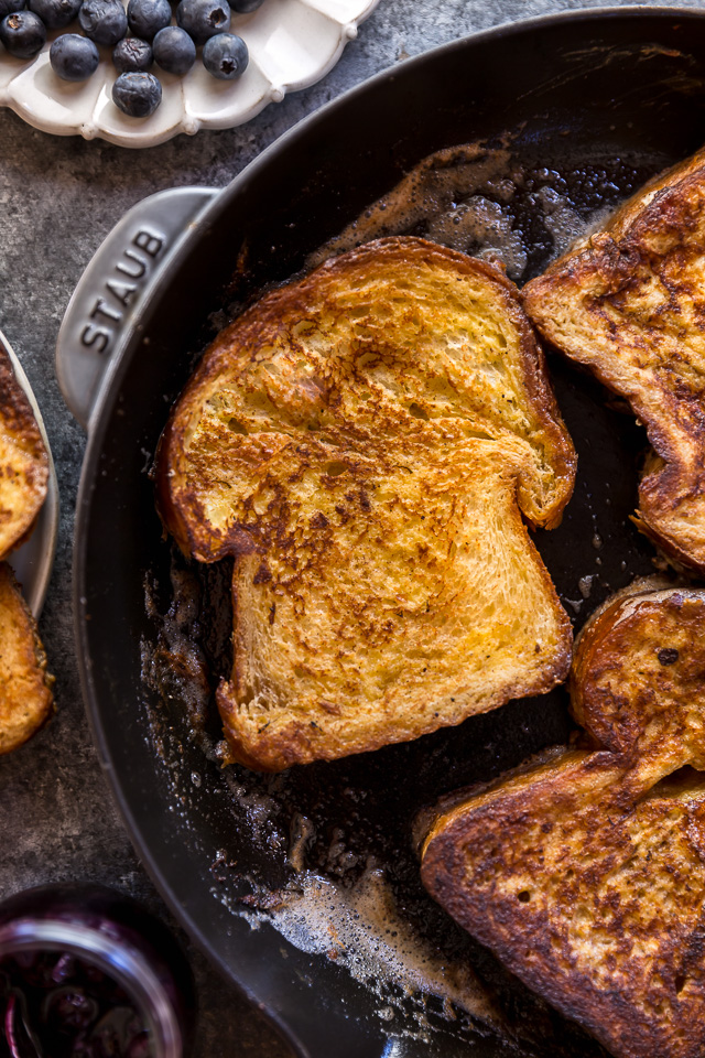 Buttery slices of brioche bread and fresh blueberry maple syrup make this recipe a total showstopper! While it's a little more work than most breakfast casseroles, it's totally worth it! This Brioche French Toast with Blueberry Compote is a great recipe for a lazy Saturday, Christmas morning, or anytime you want to make breakfast extra special! #frenchtoast #blueberrycompote #brioche #briochefrenchtoast #breakfast