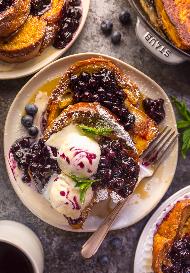 Buttery slices of brioche bread and fresh blueberry maple syrup make this recipe a total showstopper! While it's a little more work than most breakfast casseroles, it's totally worth it! This Brioche French Toast with Blueberry Compote is a great recipe for a lazy Saturday, Christmas morning, or anytime you want to make breakfast extra special! #frenchtoast #blueberrycompote #brioche #briochefrenchtoast #breakfast